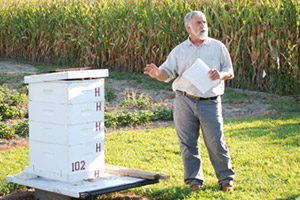 Bob Mitchell at field day. Public outreach goes along with Delaware State Apiarist duties.